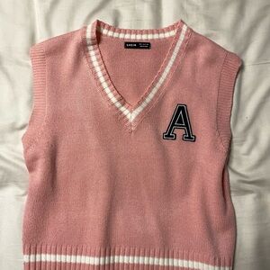 Pink letterman vest for schoolgirls